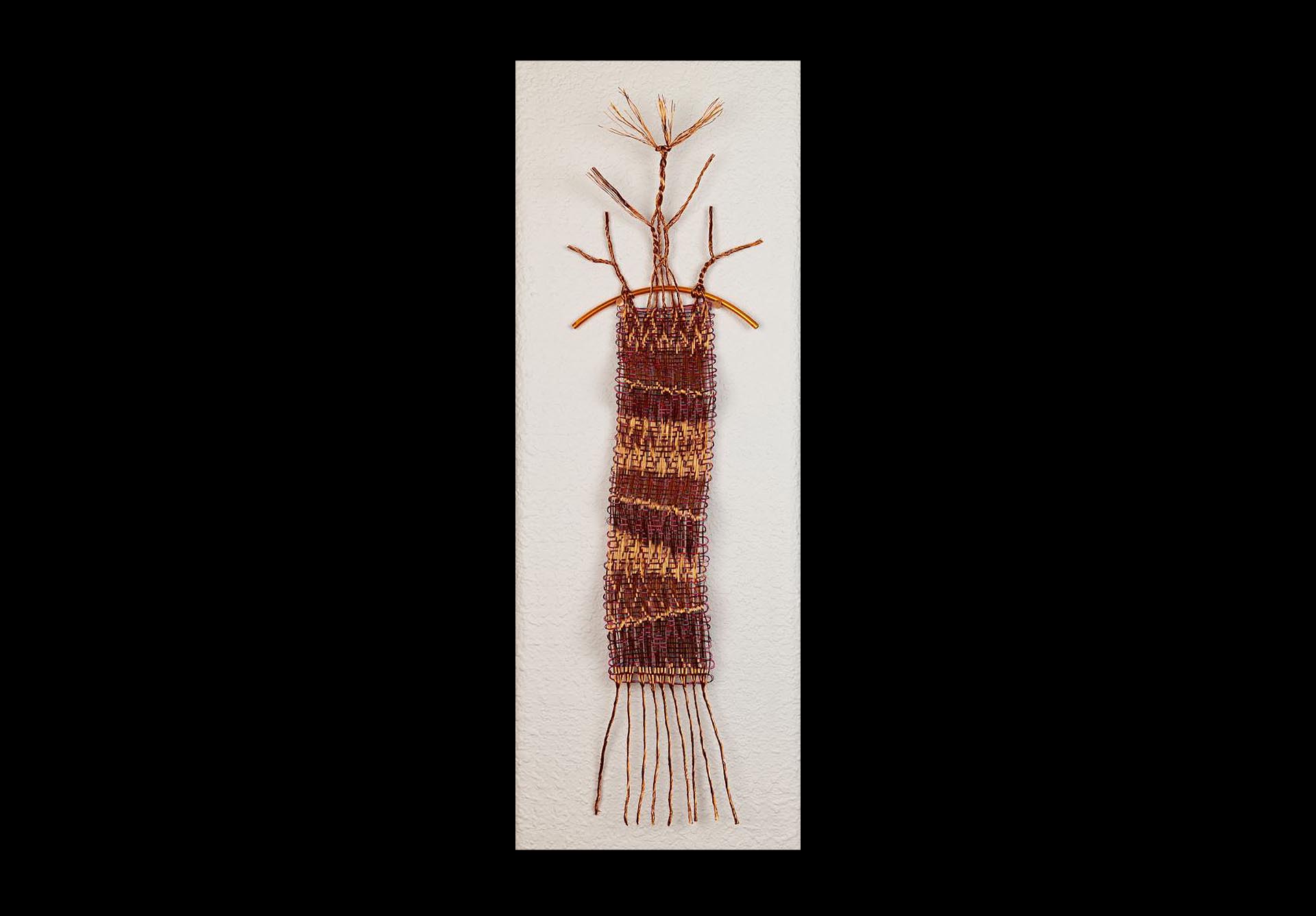 Weaving with copper wire on weaving sticks